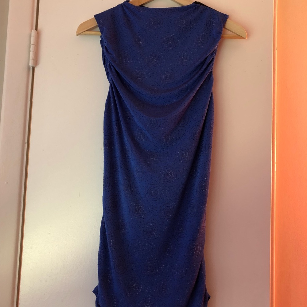 Beautiful starry blue sleeveless shirt.